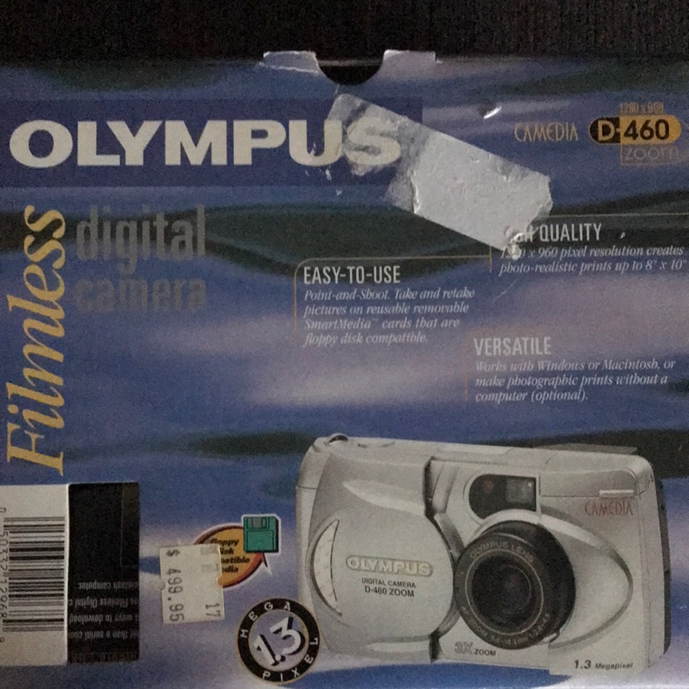 Olympus silver mint condition camera.